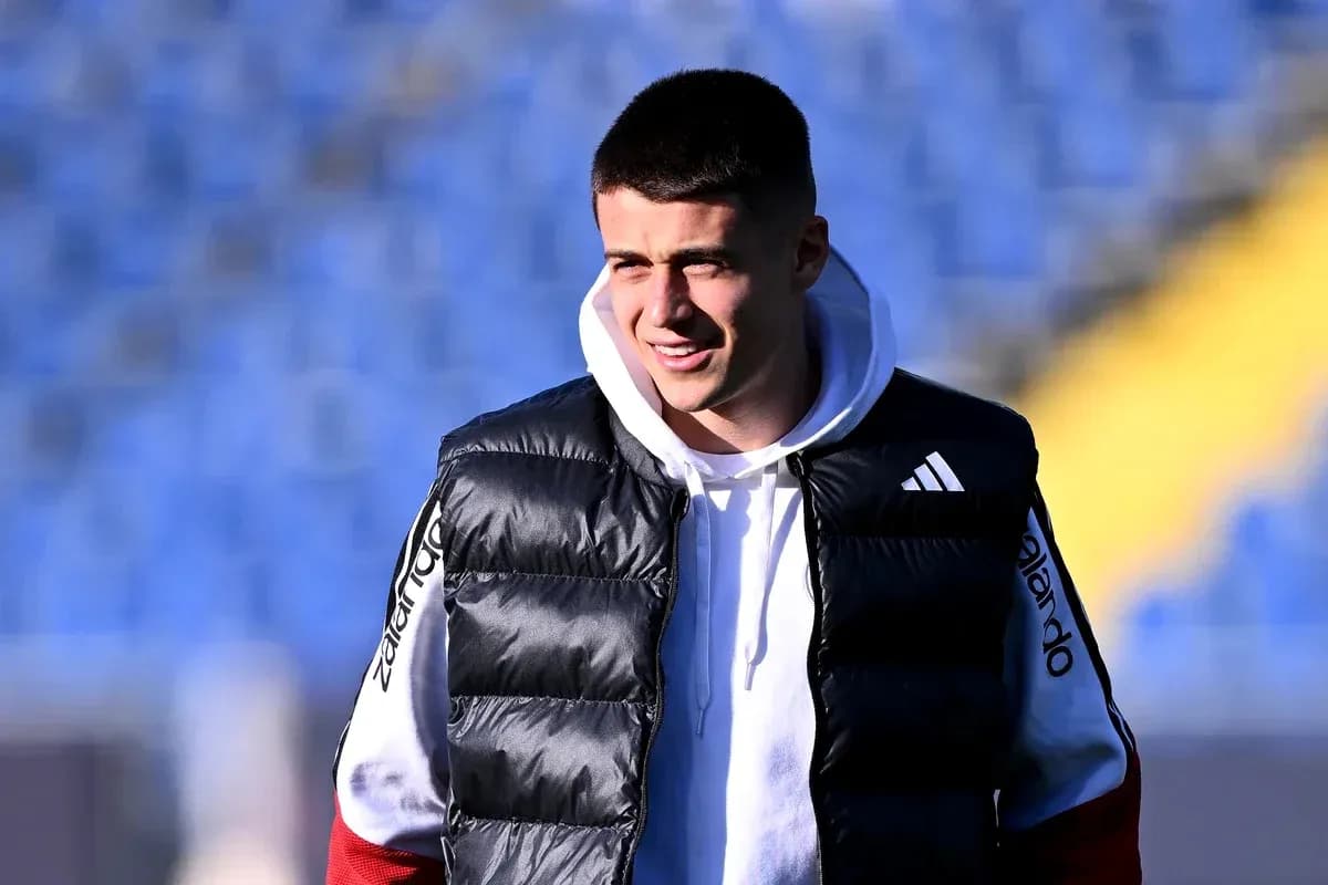 Player in puffer vest during training session