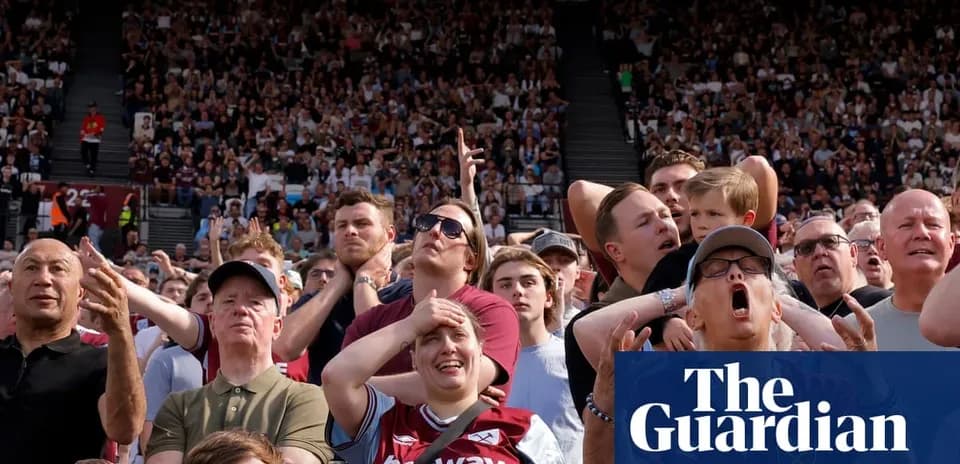 Crowd reacting passionately during a football match