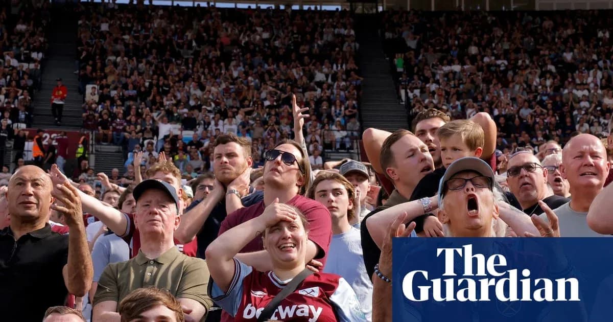 Crowd reacting passionately during a football match