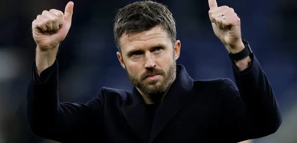 Coach giving thumbs up after match conclusion