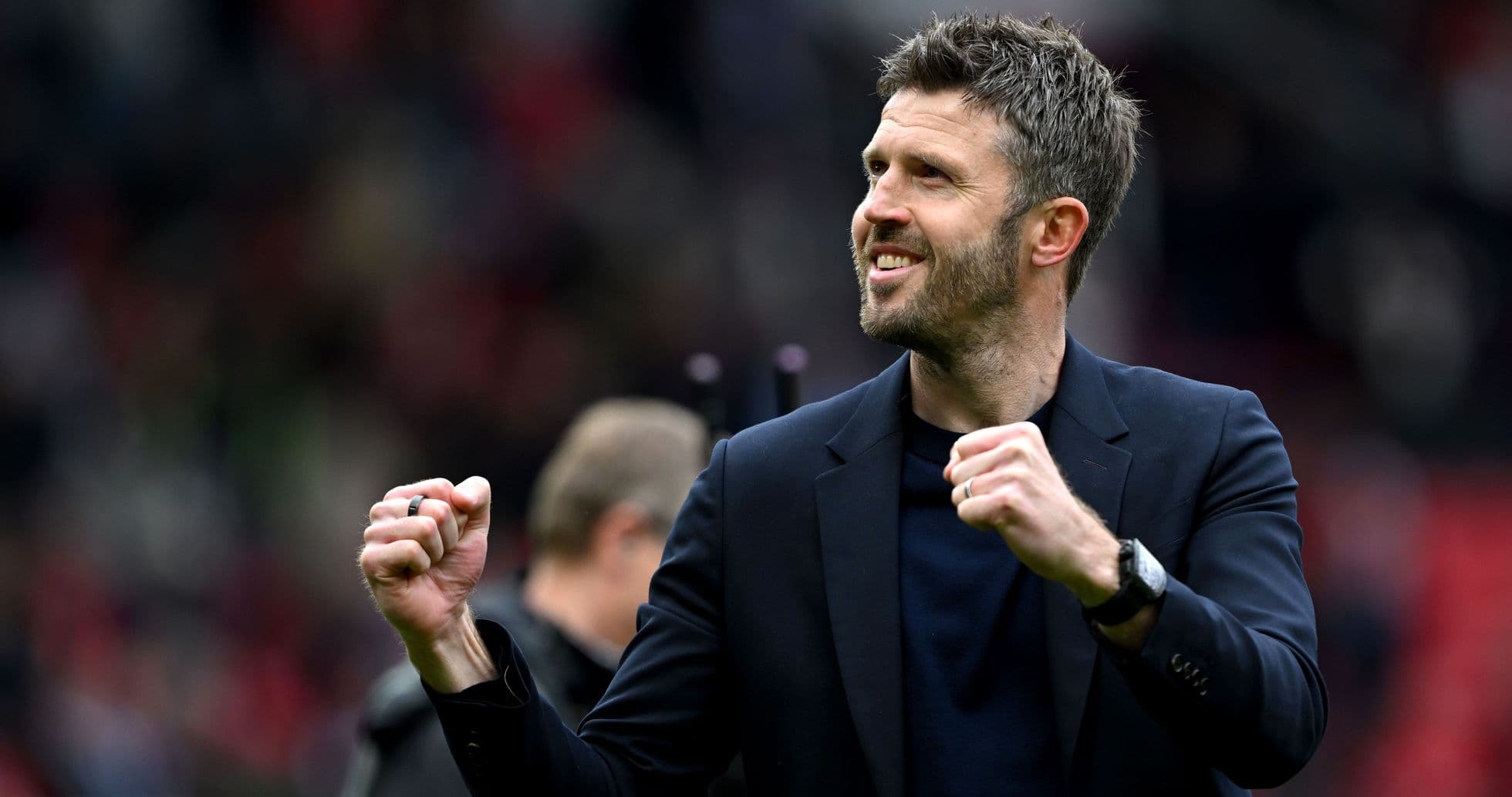 Coach celebrating victory with clenched fist