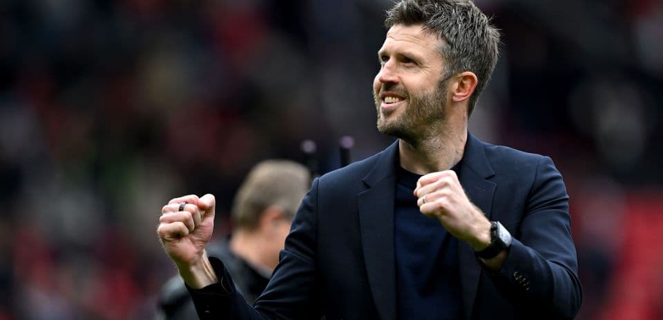Coach celebrating victory with clenched fist