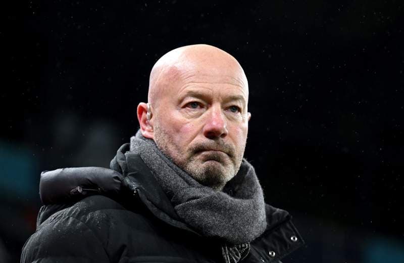 Manager observing the game from the sidelines