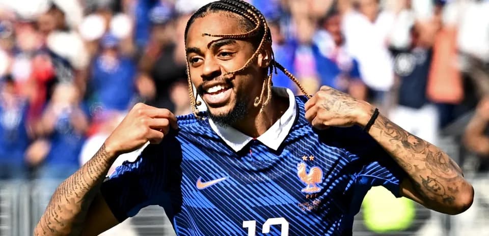 Player celebrating while wearing France national team jersey
