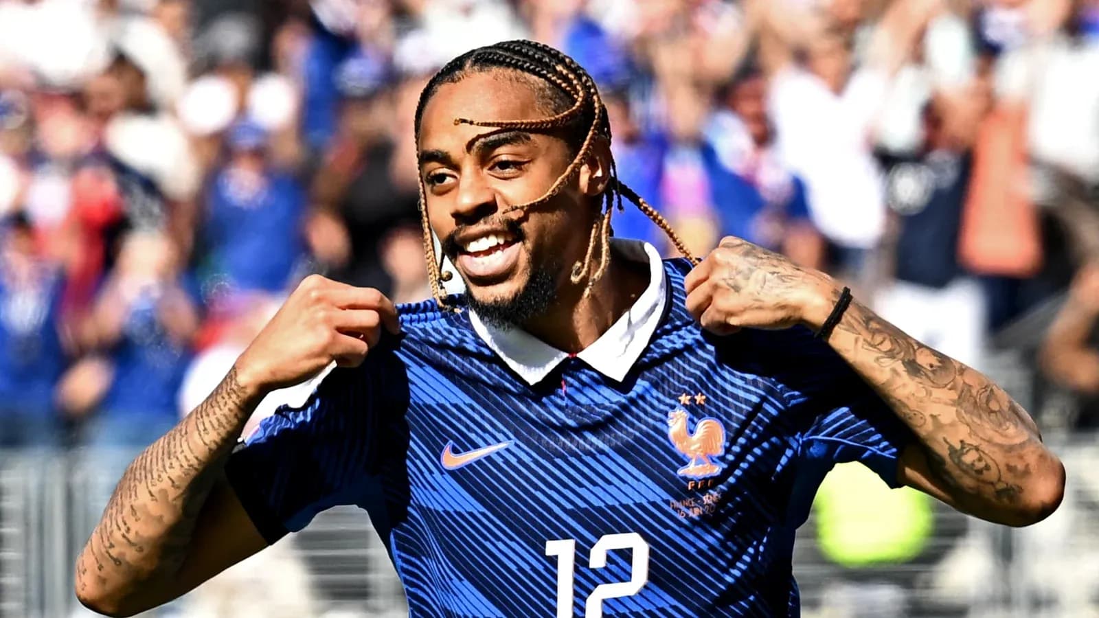 Player celebrating while wearing France national team jersey