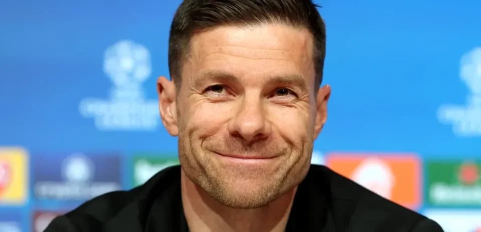Coach speaking at UEFA Champions League press conference