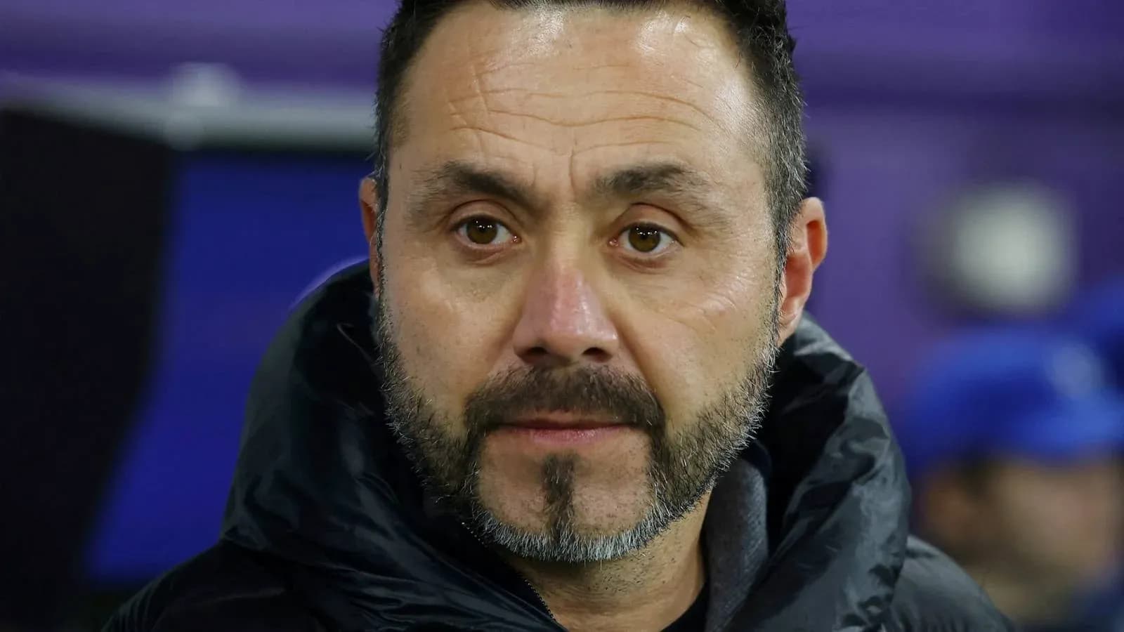 Close-up of a coach on the sidelines