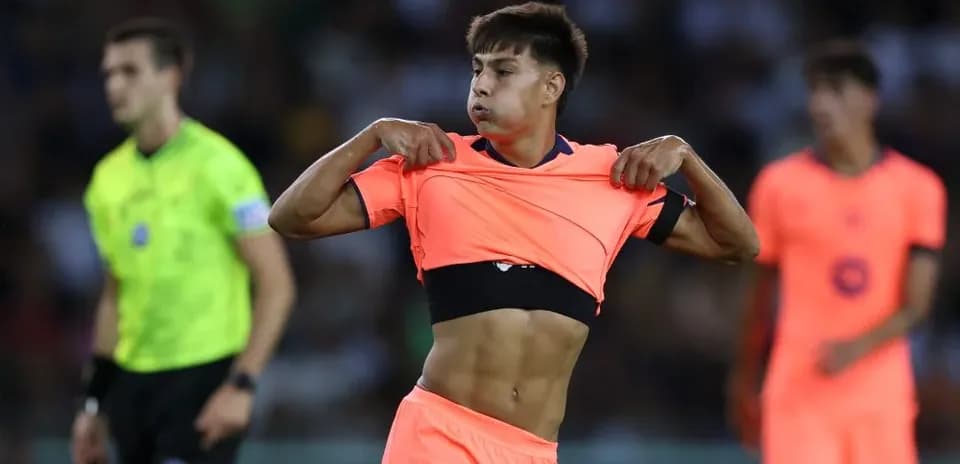 Player removing shirt during football match