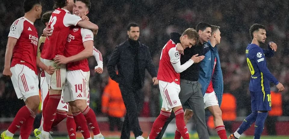 Arsenal players celebrating after the match