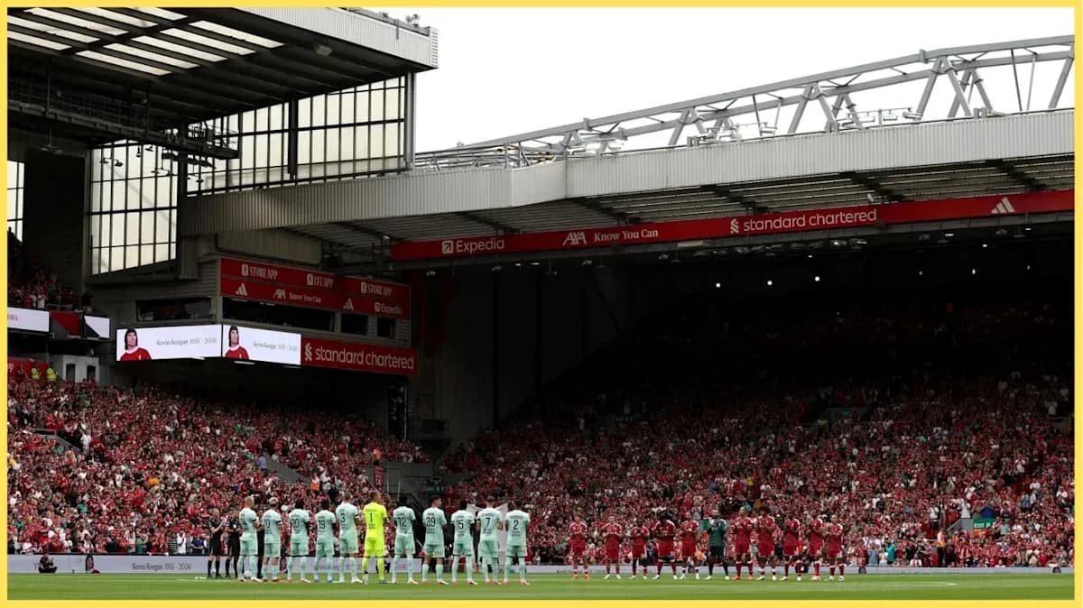 Teams lined up for a tribute at Anfield stadium