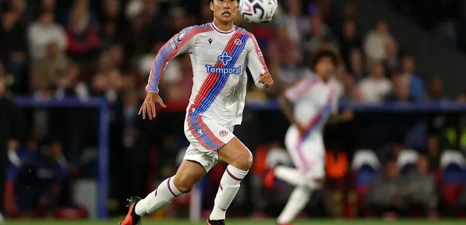 Player running with the ball during a match