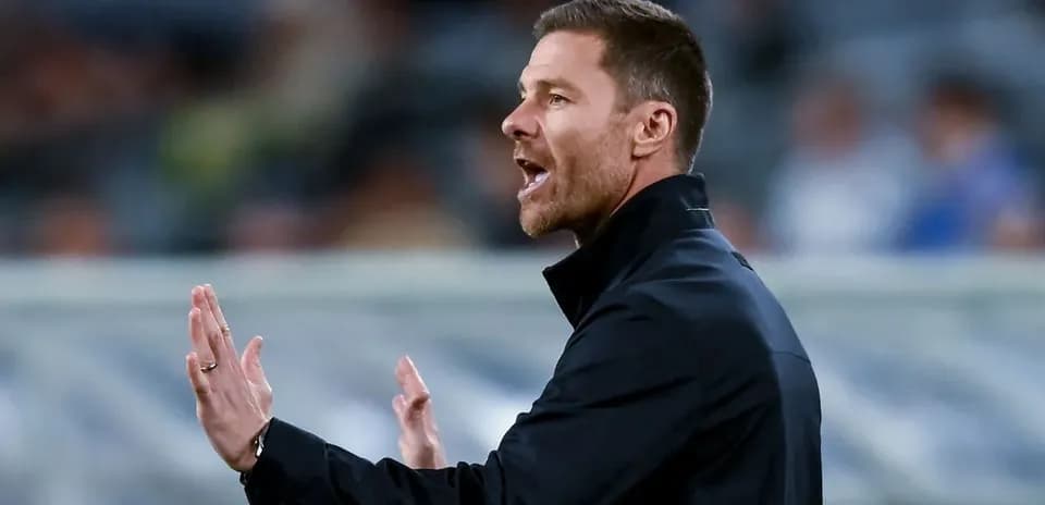 Coach gesturing during a match on the sideline