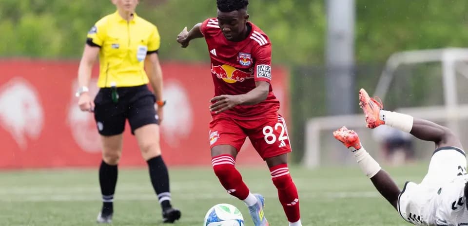 New York RB II player dribbling past opponent