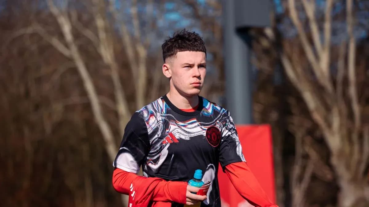 Player walking with a water bottle during training