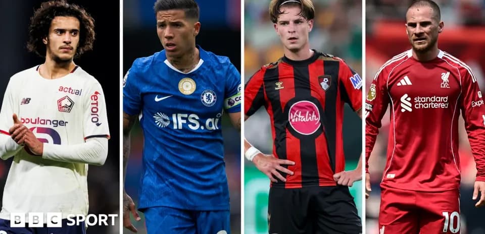 Four football players from different clubs in action