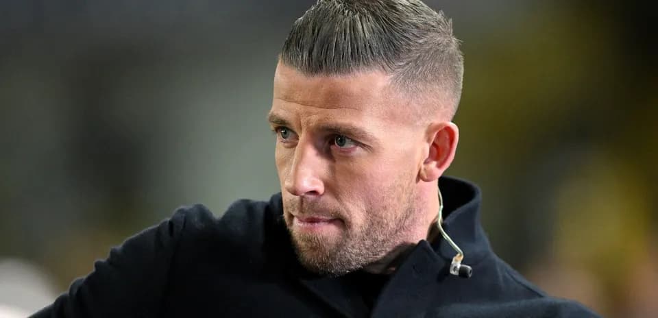 Close-up of a man with short hair in jacket