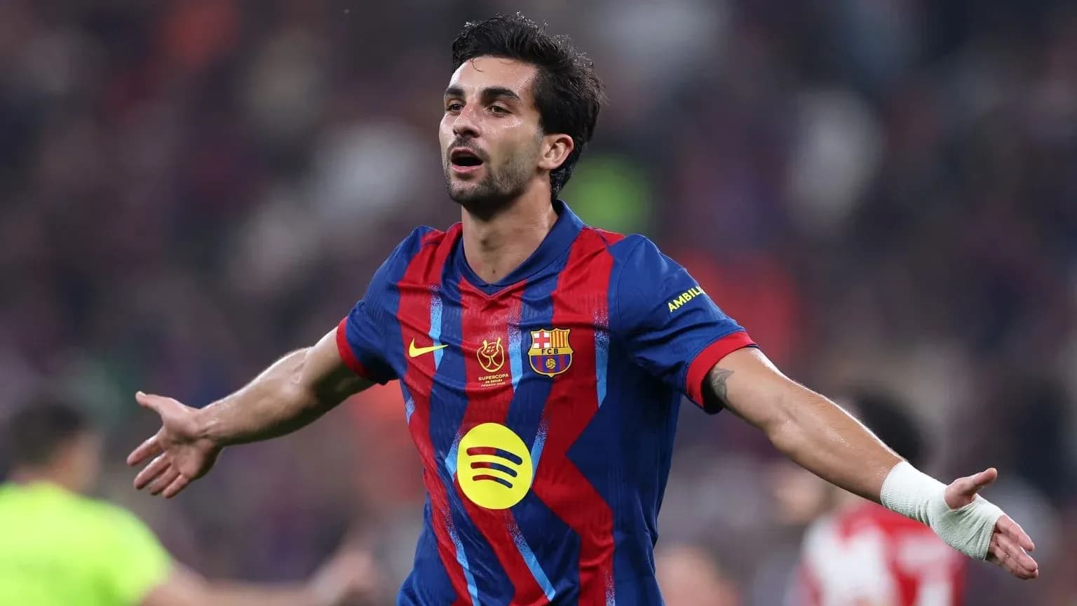 Player celebrating after scoring a goal for Barcelona
