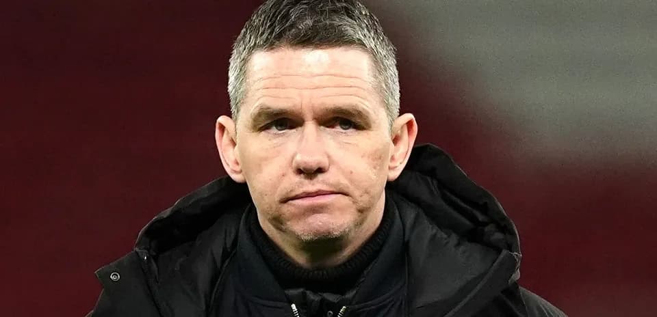 Coach on the sidelines during a match