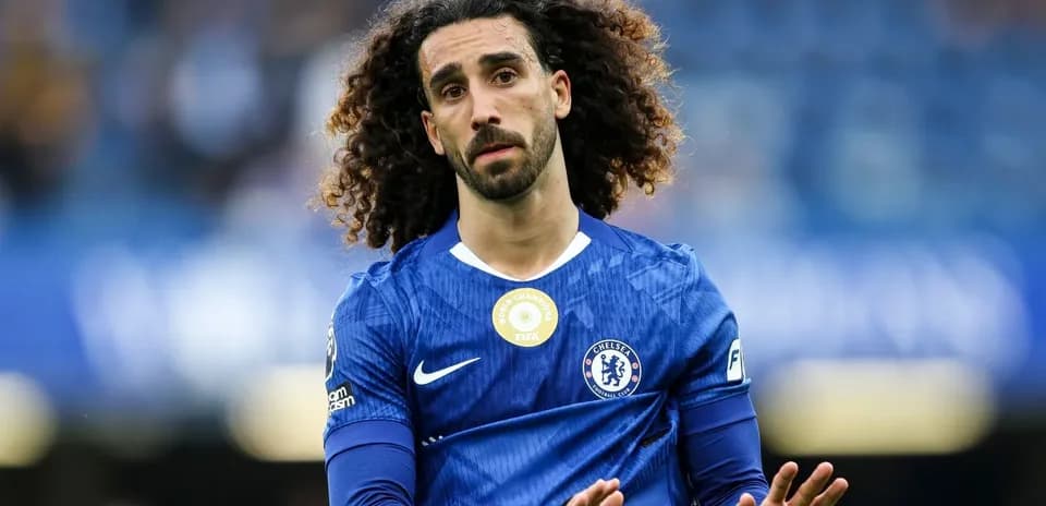 Player in blue Chelsea kit on the pitch