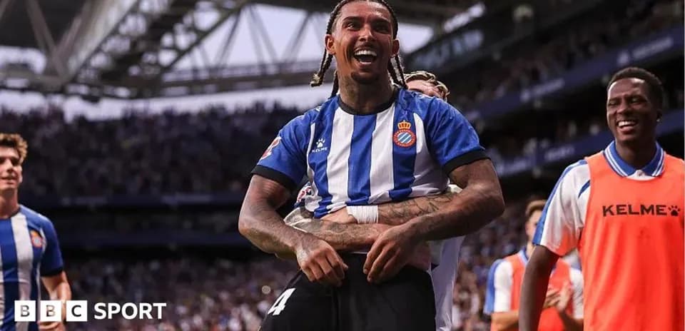 Espanyol player celebrating a goal with teammates