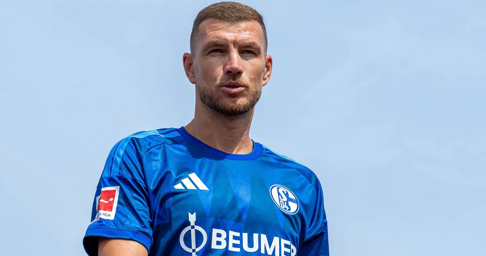 Player in blue Schalke 04 jersey outdoors