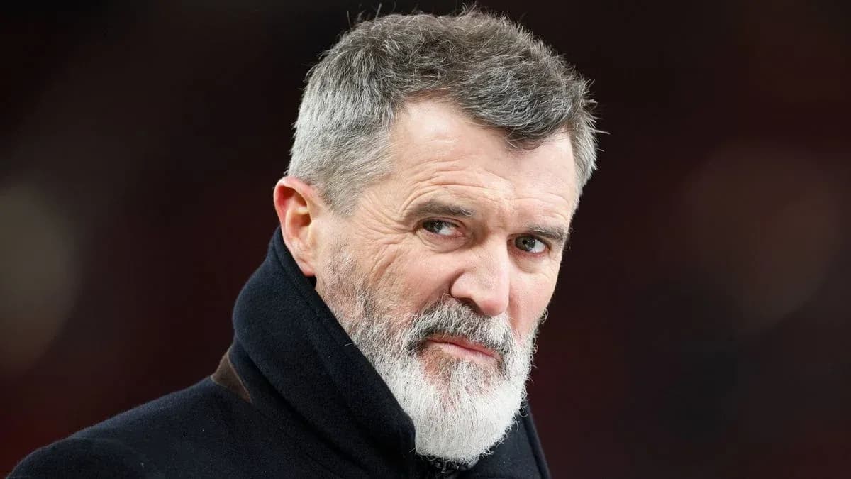 Man with gray beard and serious expression