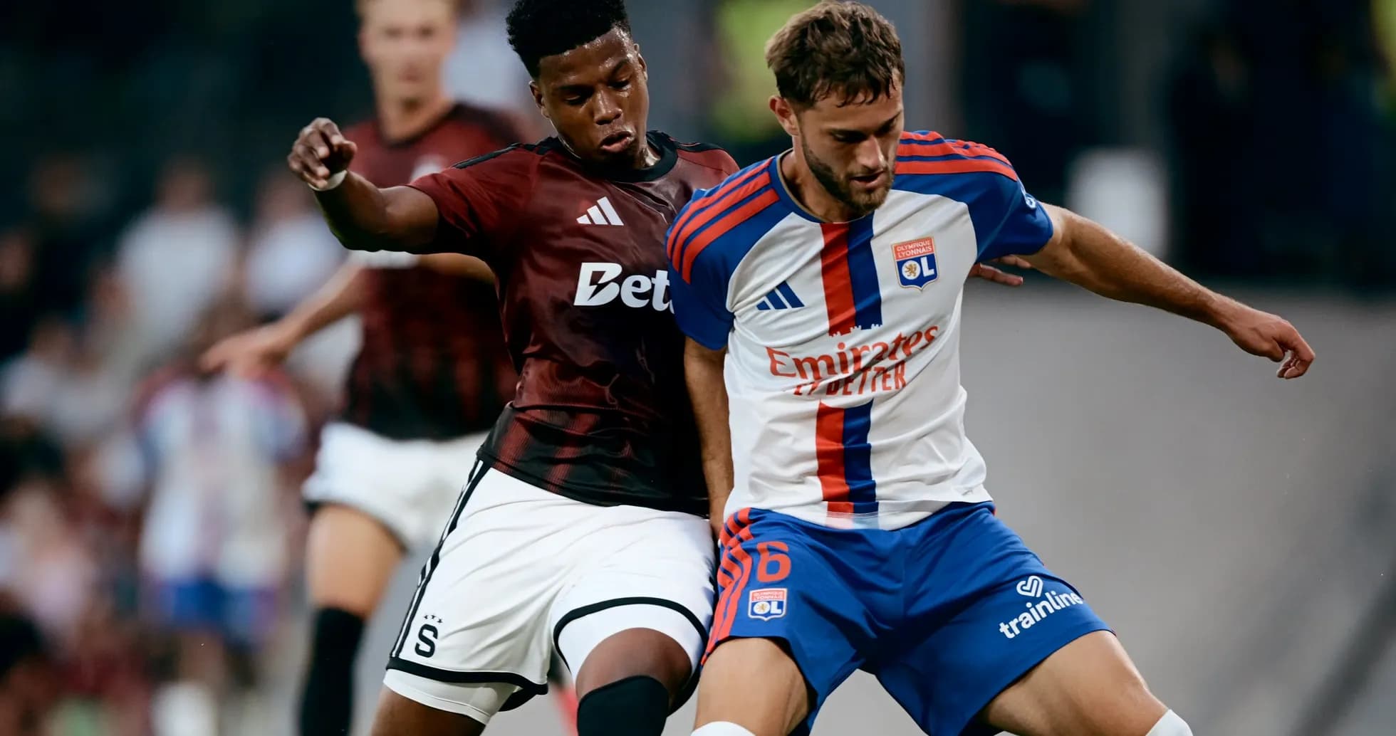 Lyon player competing against Sparta Praha player