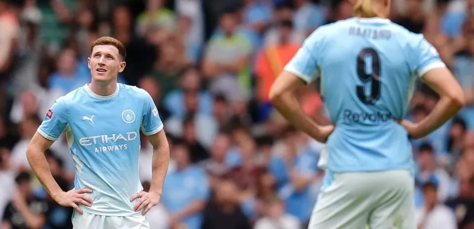 Manchester City players on field during match