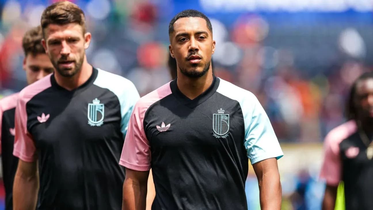 Players walking onto the field in team uniforms