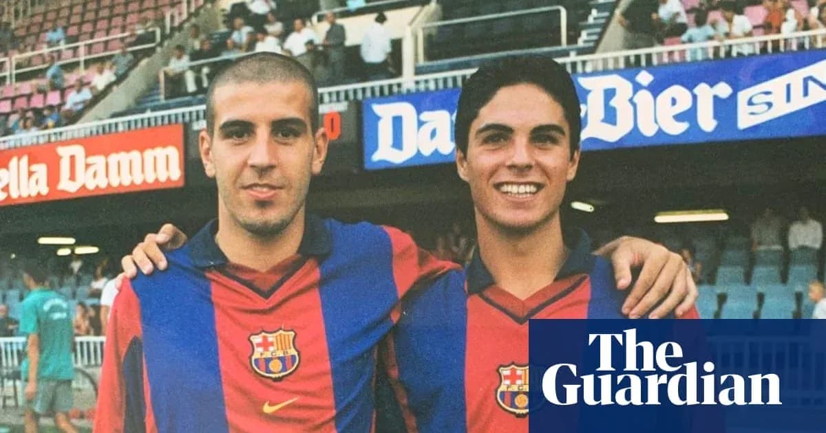 Two FC Barcelona players posing together in stadium