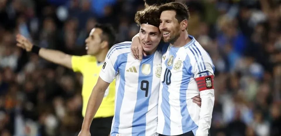 Two Argentina players celebrating during a match