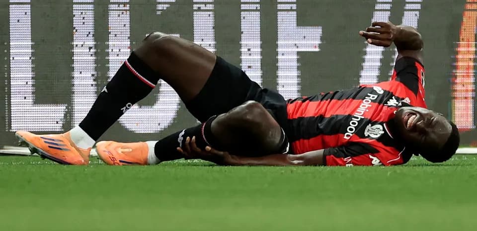 Player lying on the ground in pain during match