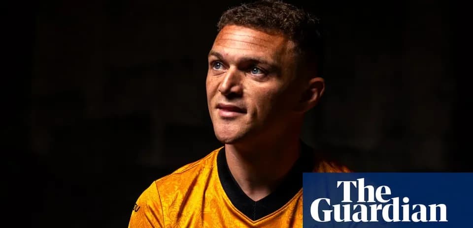 Player in orange jersey during portrait session