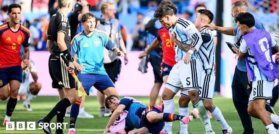 Players arguing after a foul during the match