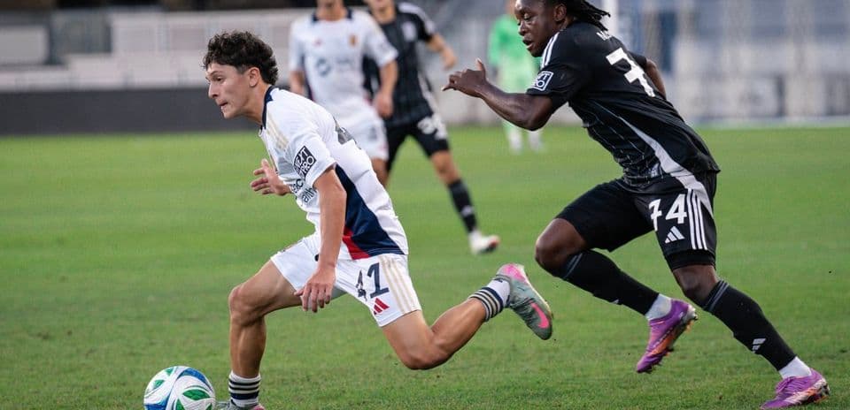 Player dribbling during Real Monarchs match
