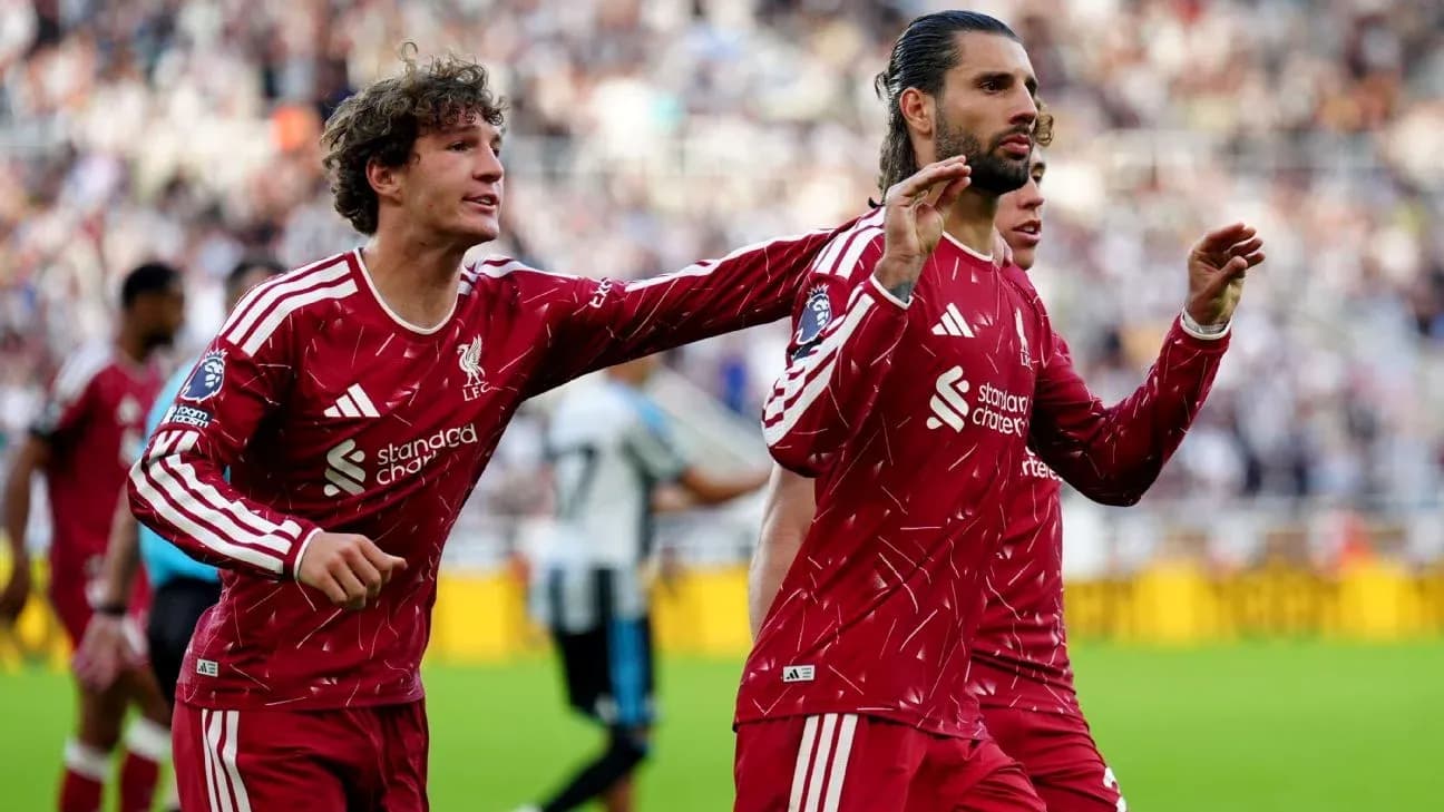 Liverpool players celebrating a goal during match