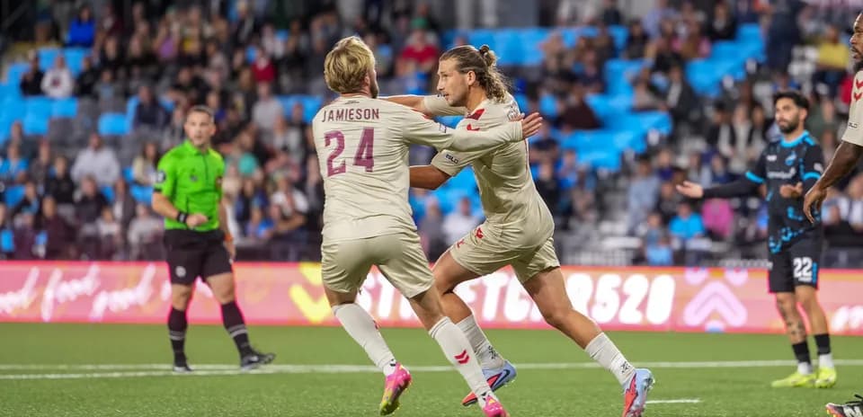 Players celebrating during Colorado Springs match