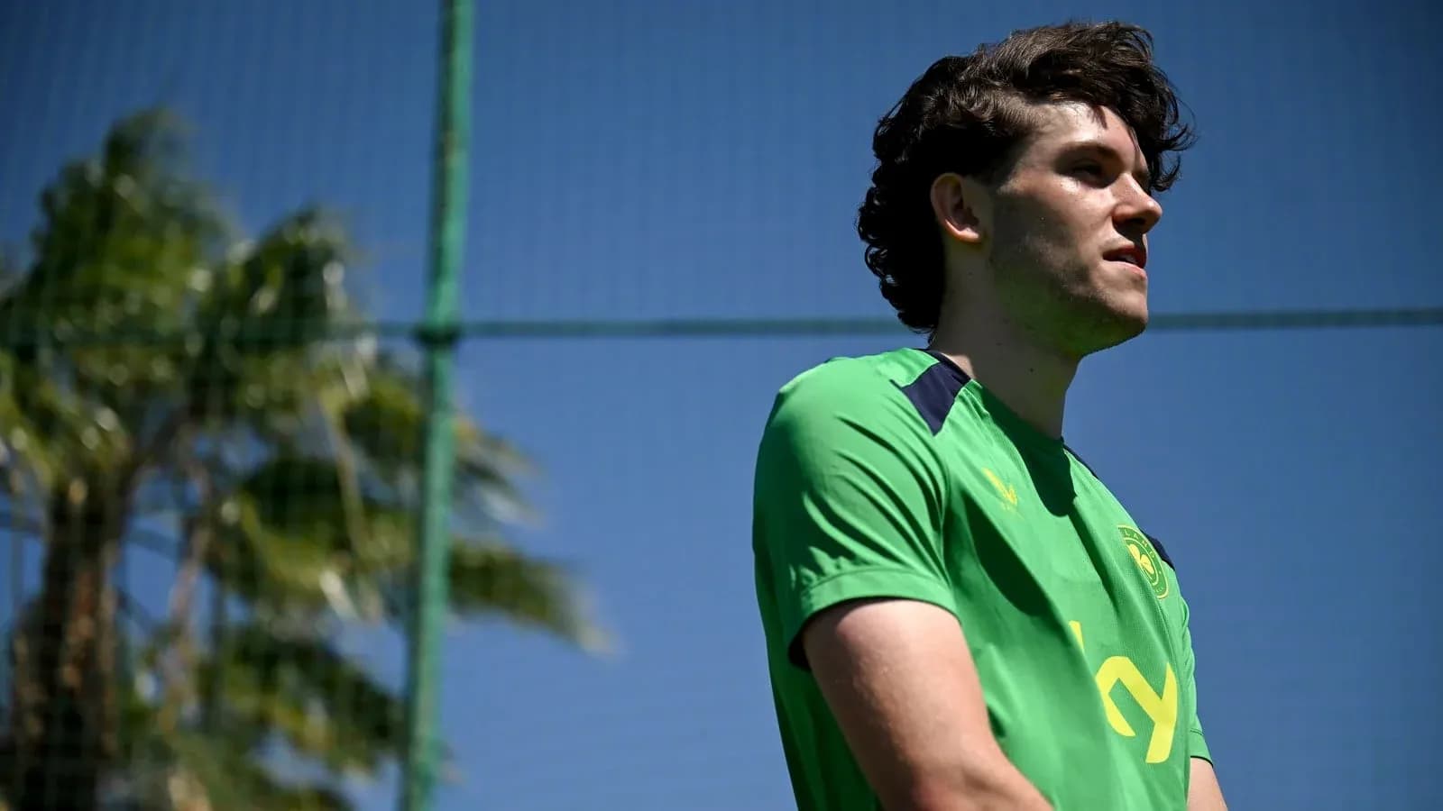 Player in green jersey at training session