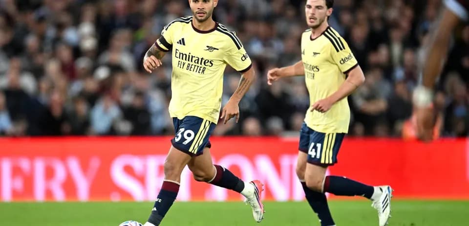Two Arsenal players on the field during match