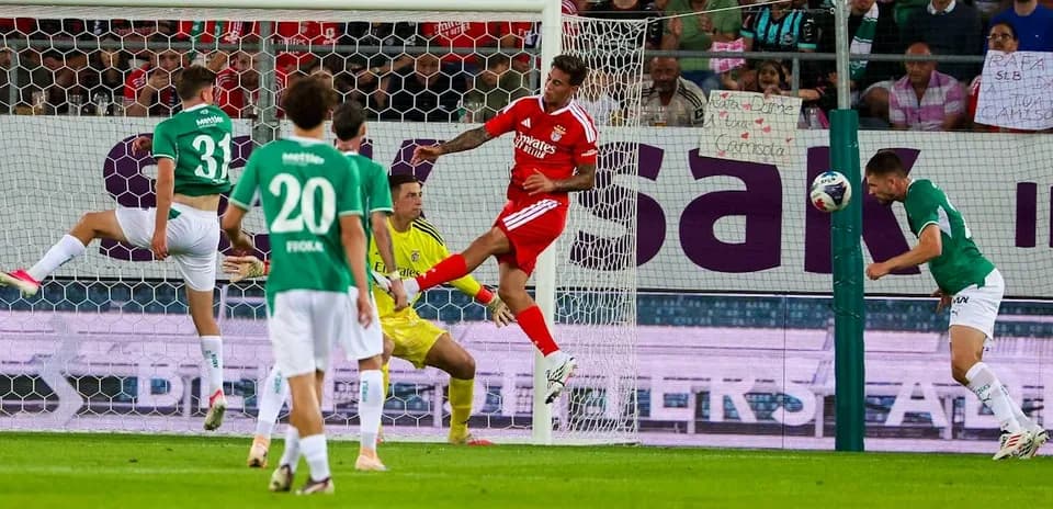 Players competing during FC St. Gallen vs Benfica match