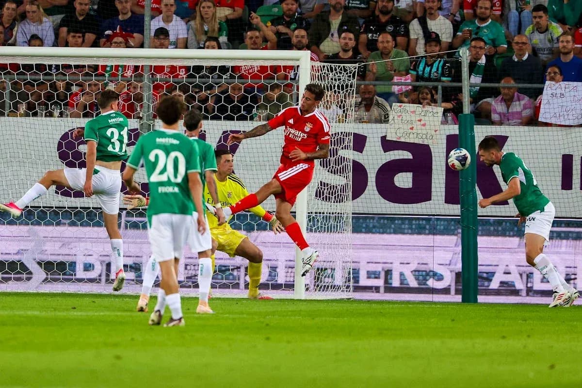 Players competing during FC St. Gallen vs Benfica match