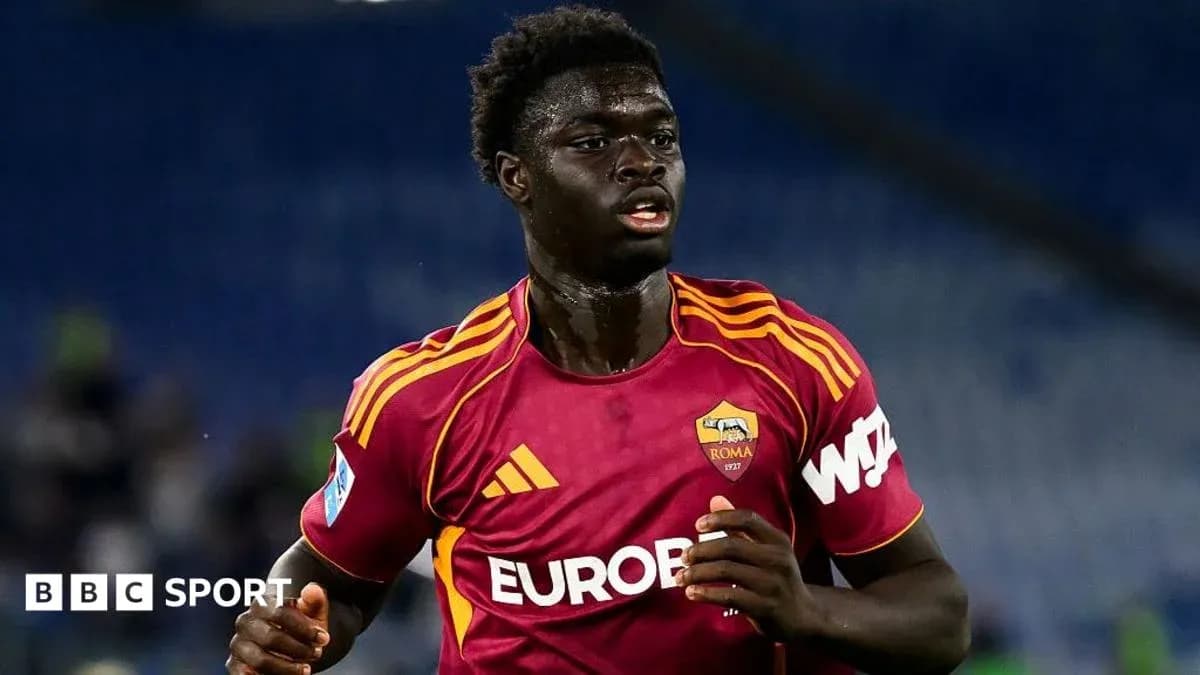 Player running in AS Roma kit during match