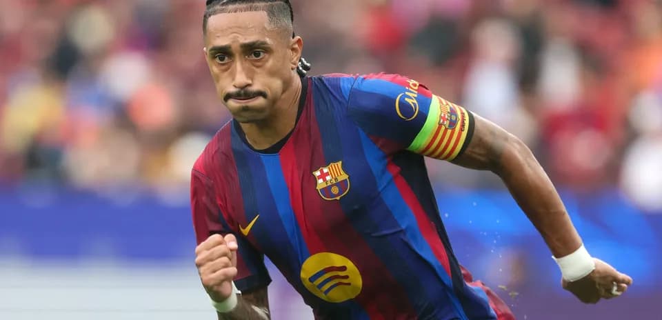 Player in Barcelona kit running on the field