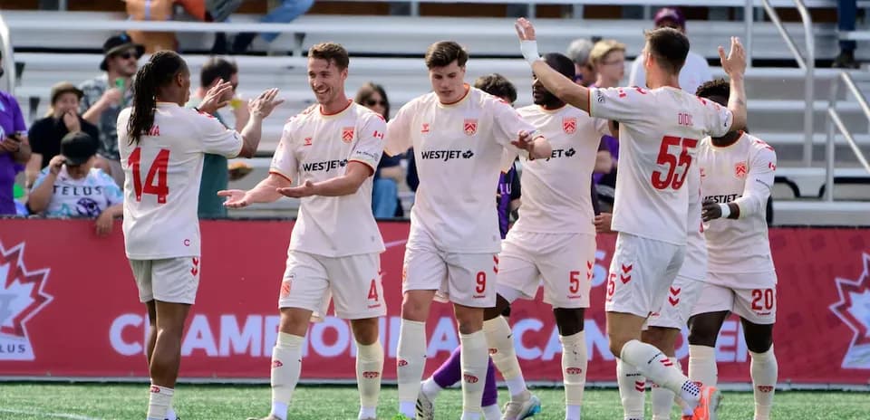 Cavalry FC celebrating a goal during match