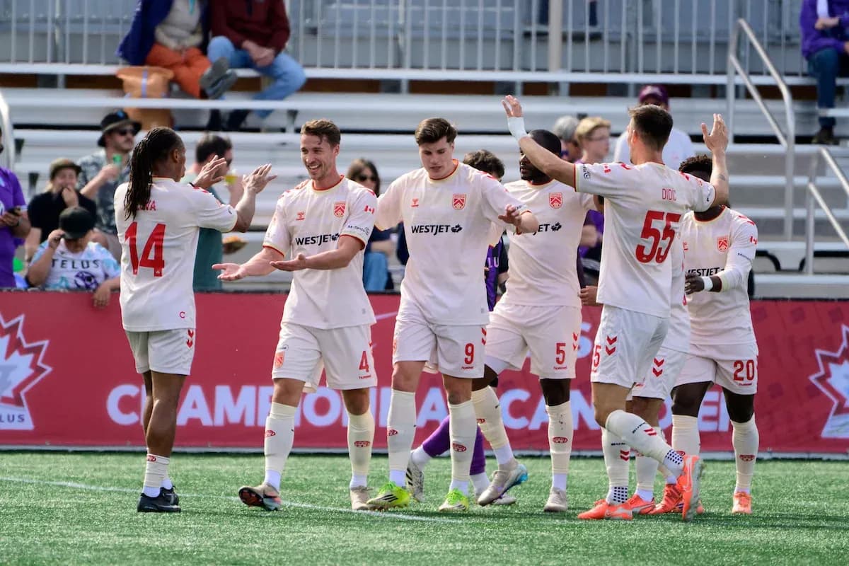Cavalry FC celebrating a goal during match