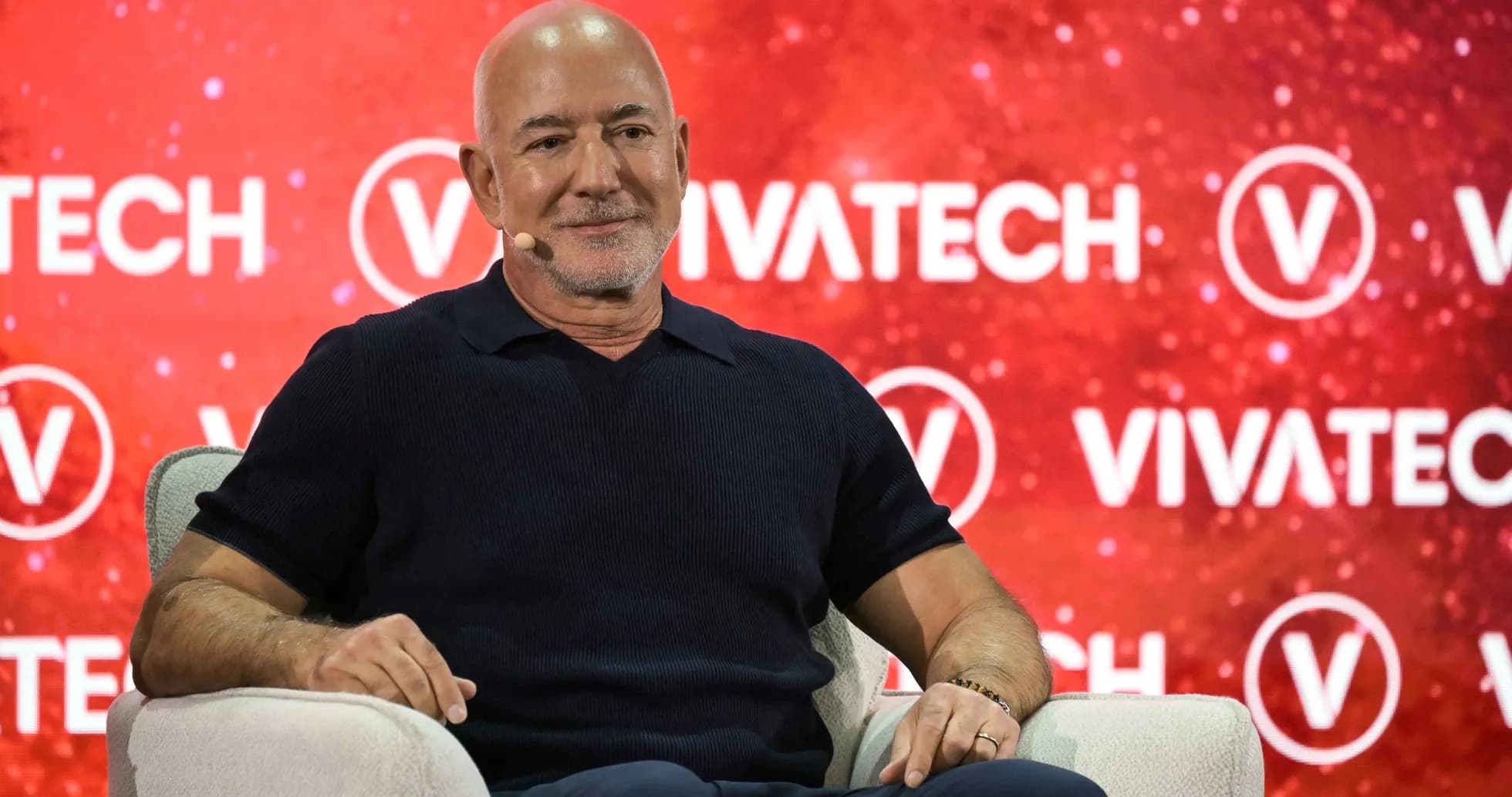 Speaker sitting on stage at Vivatech event