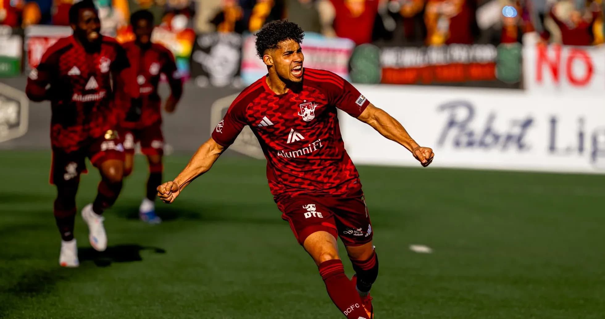 Player celebrating goal during JAX vs Detroit City match