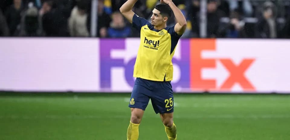 Player celebrating after scoring during match