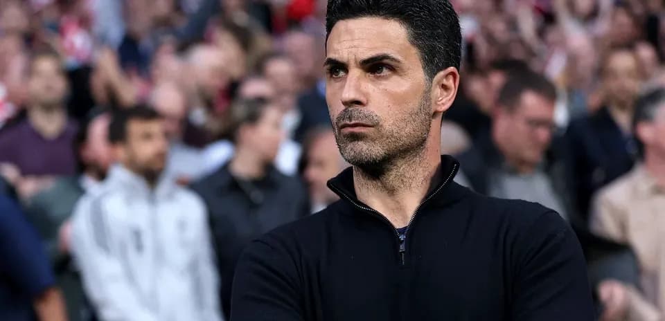 Manager observing match from the sidelines