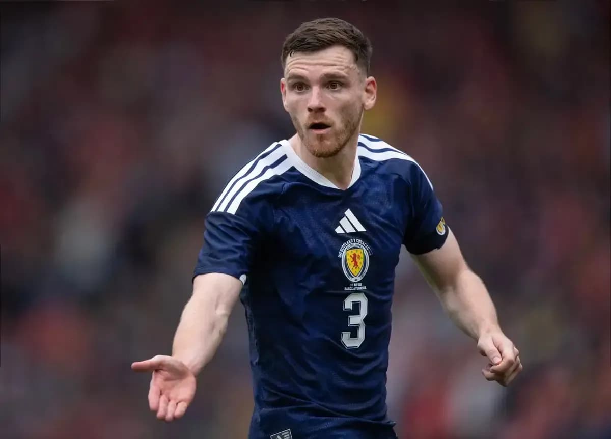 Player gesturing during a football match in Scotland kit